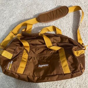 Supreme Brown and Yellow Duffel Bag